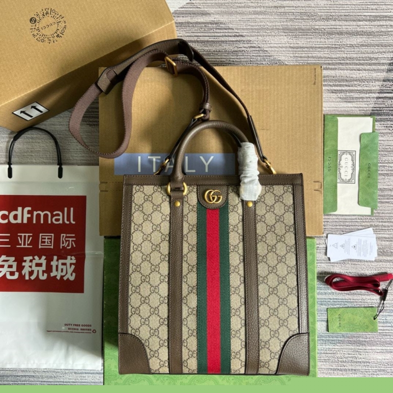 G*u*i shopping bags